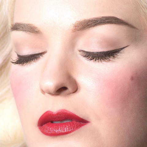 Woman Wearing Bésame Cosmetics Red Lipstick